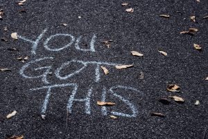 On the sidewalk written chalk it reads, "You got this." This represents the confidence you will feel after beginning online therapy in Atlanta, GA with Faith and Family Empowerment.