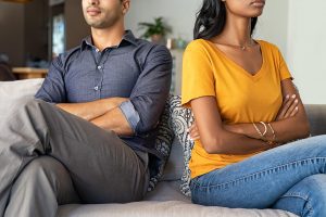 A couple sit facing away from one another as they sit arms folded. Marriage counseling in Decatur, GA can offer support with communication issues. Contact a marriage counselor in Norcross, GA to learn more about Christian marriage counseling in Decatur, GA today! 30030 