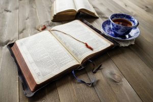 Shows a Bible with a cup of coffee. Represents how christian counseling in atlanta, ga and pastoral counseling in atlanta, ga can support you.
