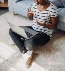 Shows a person attending virtual pastoral counseling in atlanta, ga. Represents how a black christian therapist atlanta will support you virtually with christian counseling in atlanta, ga.