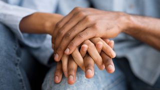 Shows a couple holding hands. Represents how atlanta christian marriage counseling can support your marriage. Search "christian counseling in atlanta, ga" today!