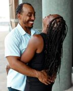 A joyful Black couple embracing and laughing together, demonstrating the daily choices and intentional connection taught through decatur marriage counseling with a marriage counselor in atlanta, ga.