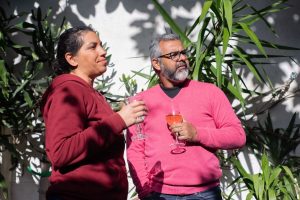 A middle-aged couple shares a relaxed outdoor moment with wine glasses, representing the rekindled connection that marriage counseling in decatur, ga and a marriage counselor decatur ga can help couples rediscover.